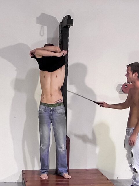 Anthony Fiasco is tied naked while Aiden Vanity pulls his rope