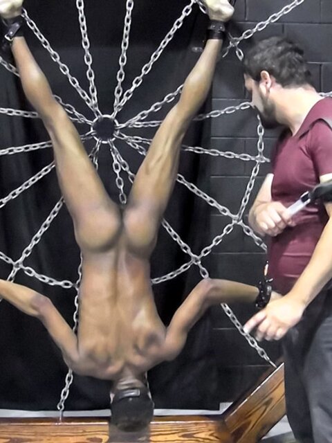 Kaden Roads spanks and plays with RT’s cock and nipples