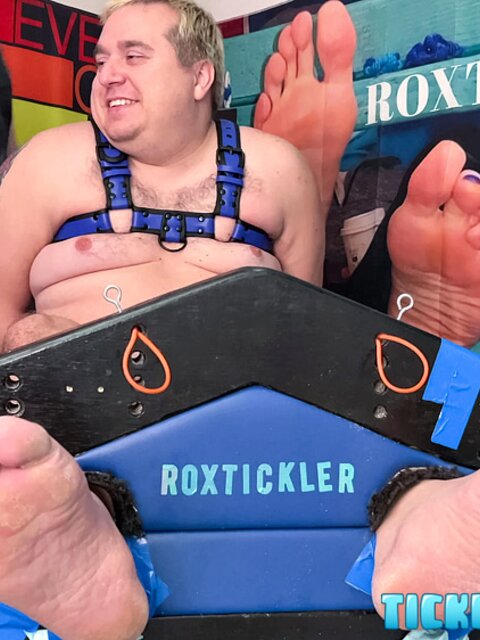 Ryan’s tickling makes Matt giggle and arch his chubby body