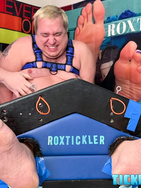 Ryan’s tickling makes Matt giggle and arch his chubby body
