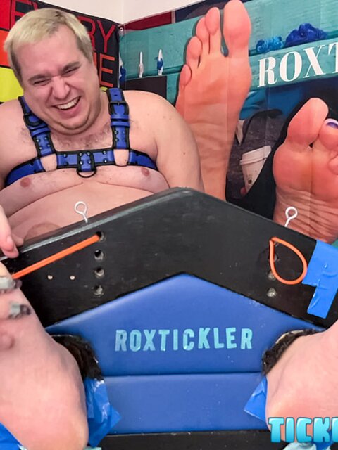 Ryan’s tickling makes Matt giggle and arch his chubby body
