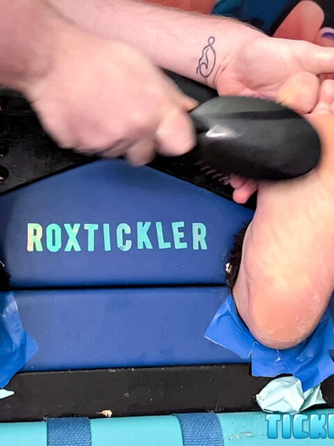 Ryan’s tickling makes Matt giggle and arch his chubby body