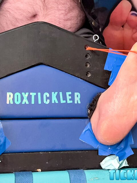 Ryan’s tickling makes Matt giggle and arch his chubby body