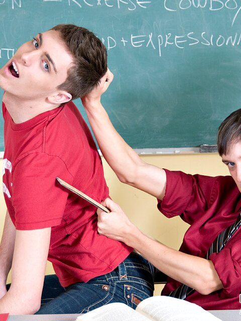 Andy Kay sucks Maddox Johnson’s cock in the classroom