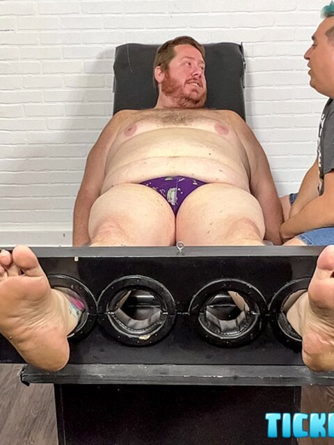 Big Red giggles as Matt teases his soles with tools