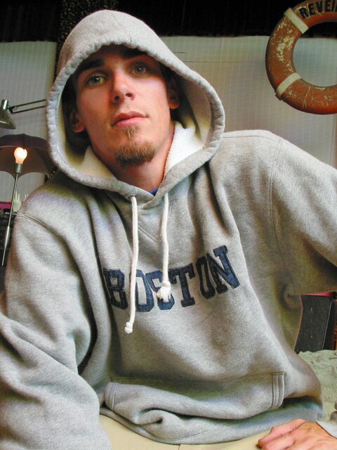 Solo jock Evan Heinze teases with baggy pants