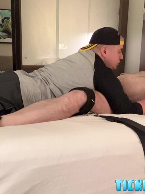 John Spencer laughs as Matt teases his bare feet