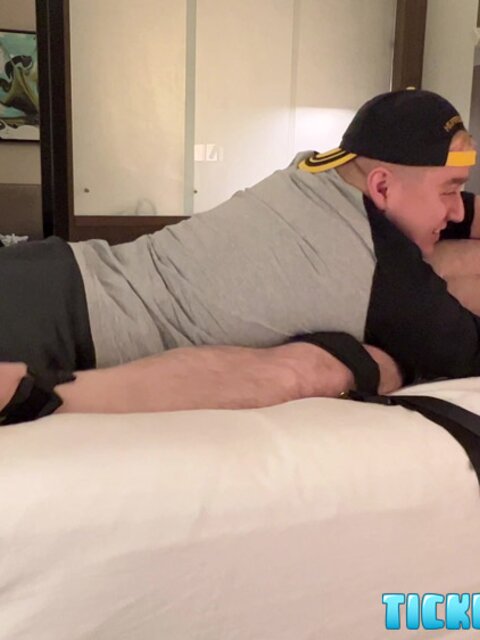 John Spencer laughs as Matt teases his bare feet