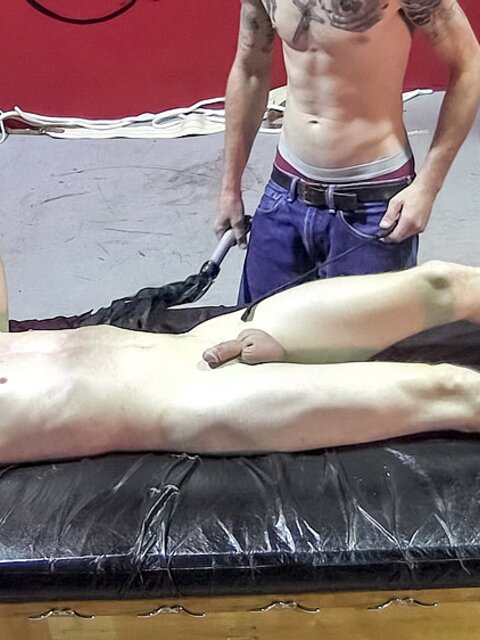 Jaden Swift examined with flogger and pinwheel by Chad Mason