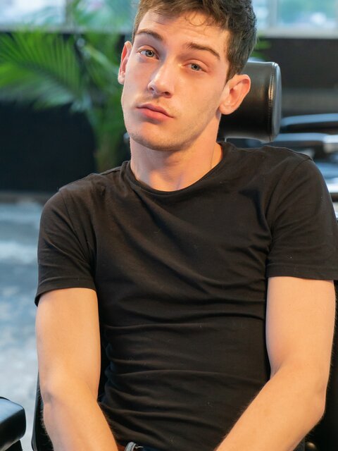 Barber Milo Madera cuts Edward Terrant’s hair then breeds him