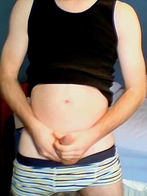 Aaron strokes slim cock and cums hard solo