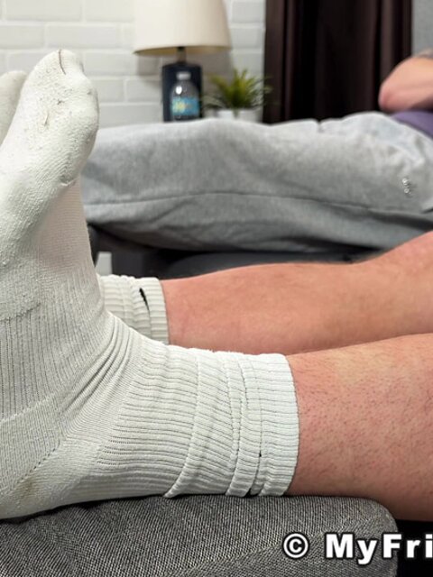 Sergei strips off his athletic socks and teases with his bare soles