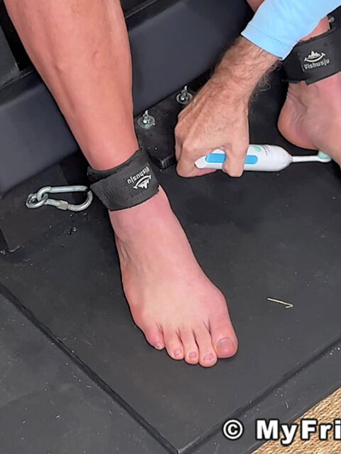 Girth gets strapped to the tickle ladder and breaks into laughter