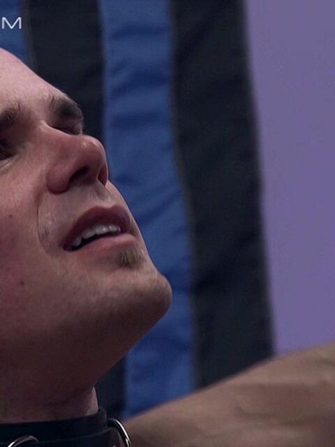 Master Derek Da Silva rips clothespins from pup Cullen Cable’s sensitive skin