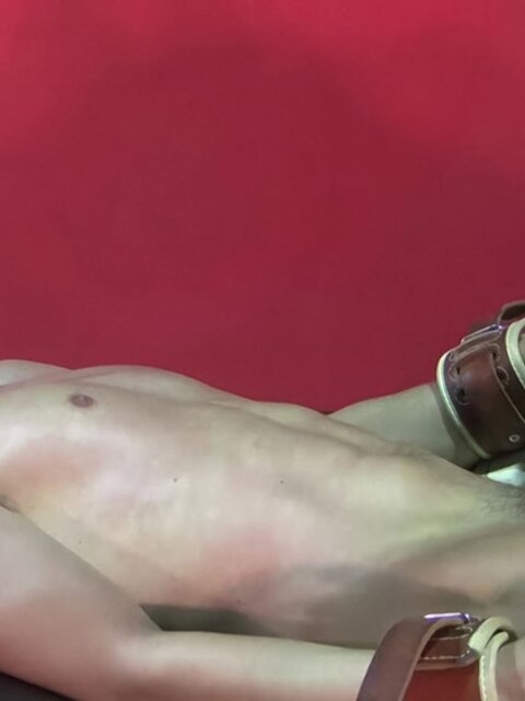 Master Tye straps down young Bruno and plays with his floppy cock until it throbs