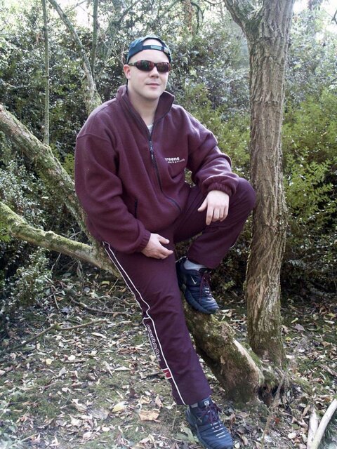 Young cub strips naked in the forest and pumps his fat cock dry