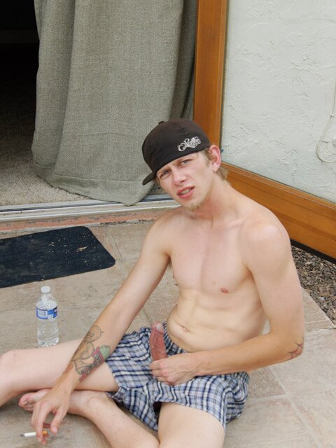Ian Madrox chainsmokes menthols while stroking his massive cock