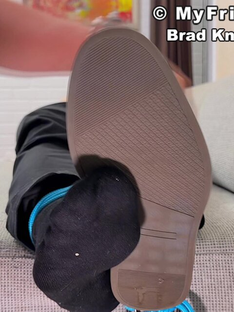 Dan Edwards worships businessman Brad Knox’s feet and body while he struggles