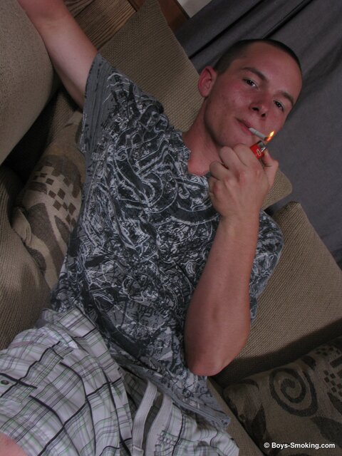 Dax chainsmokes while jerking his uncut cock