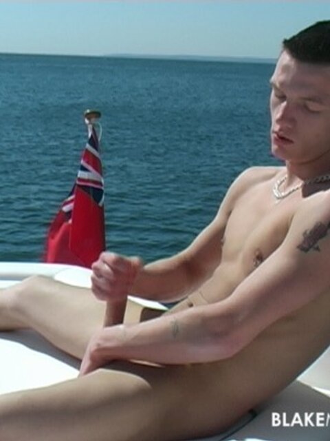 Buff boy Kai strokes his meat out on the water under the bright sun