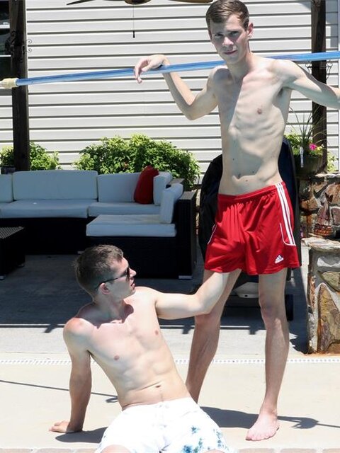 Pool boy Cameron Taylor takes Mickey Knox for a rough ride in the water