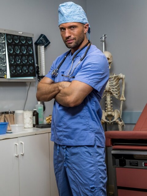 Colby Tucker finds janitor Argos Santini on night shift and closes the exam room
