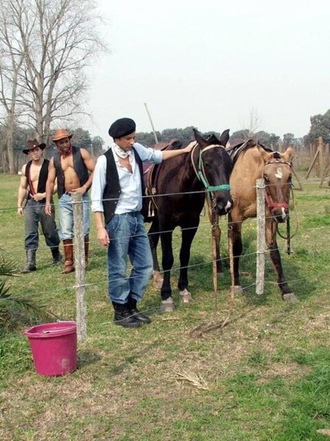 Cute twink gets hired by two horny gay cowboys