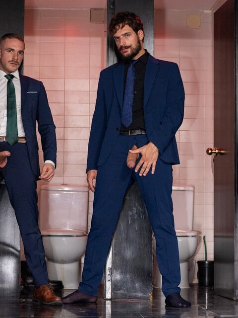 Mustached Apolo Adrii sneaks into a bathroom stall with Samuel Hodecker
