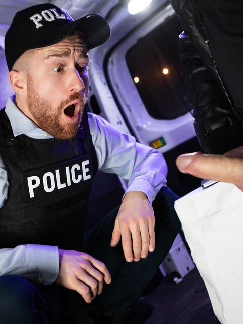 Malik Delgaty busts into the surveillance van to pound officer Olivier Robert
